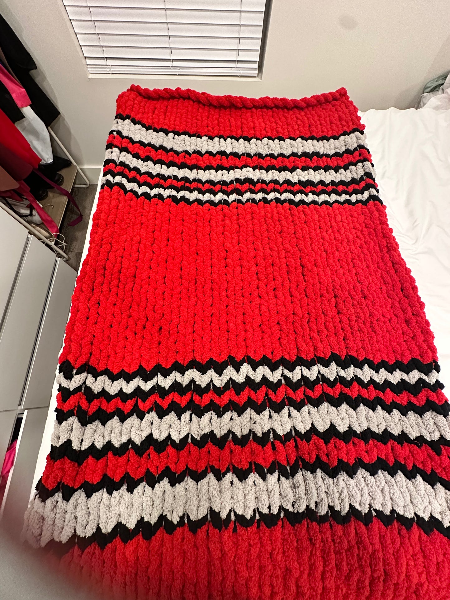 Red grey and black striped throw blanket
