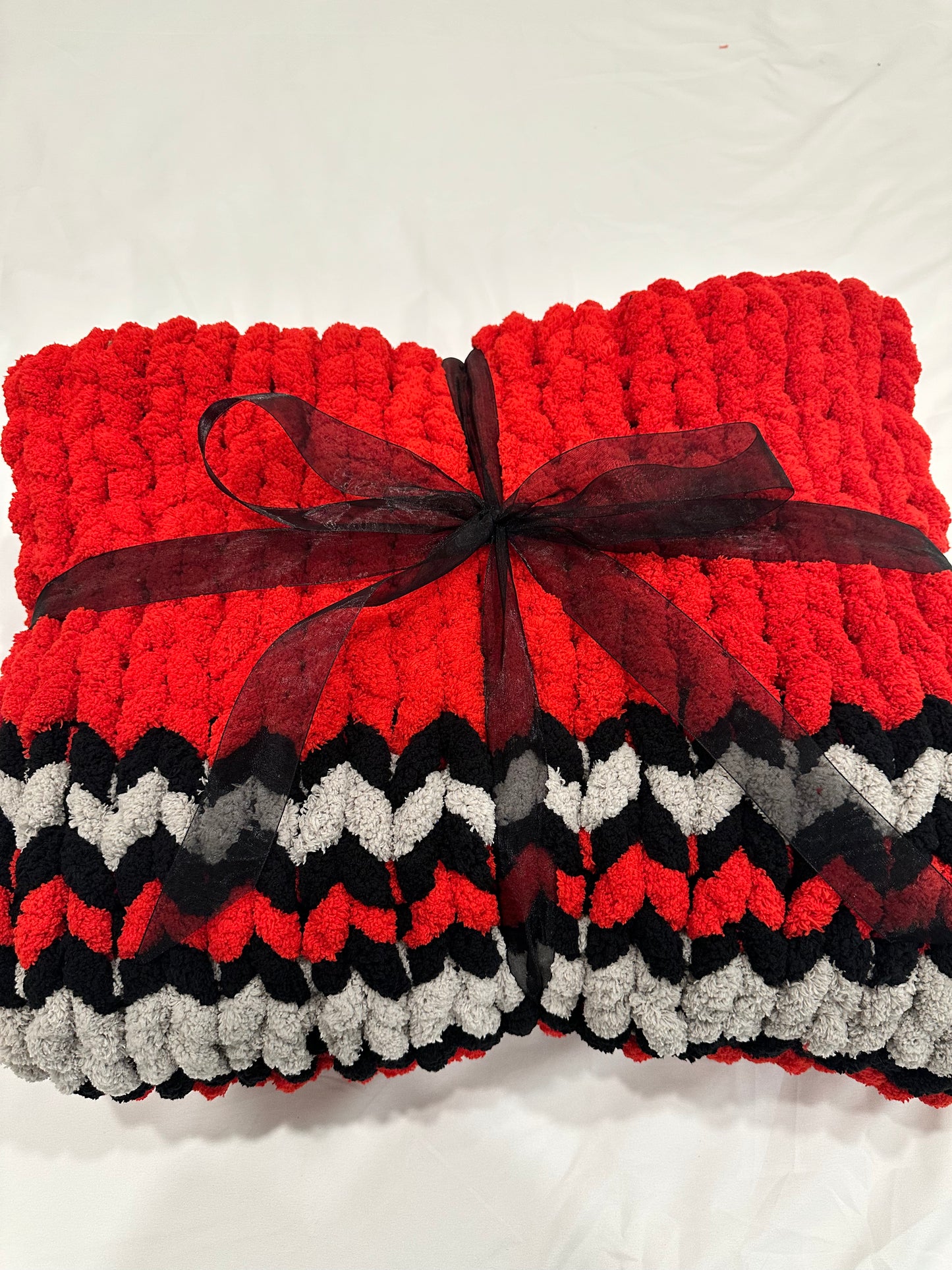 Red grey and black  striped throw blanket