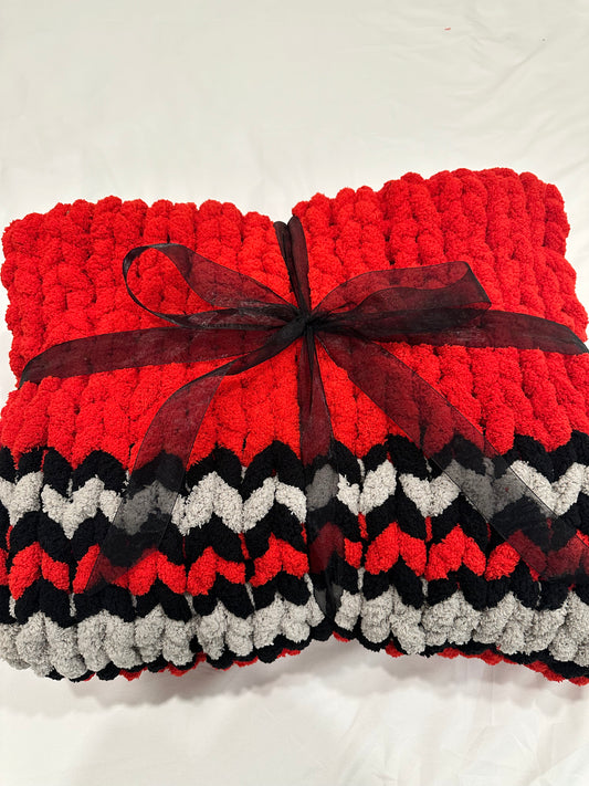 Red grey and black  striped throw blanket
